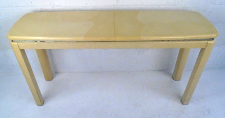 This goatskin console table is perfect in an entry hall or as a sofa table. With unique metal detailing and a protective lacquer this table looks great in home or office.

Please confirm item location (NY or NJ).