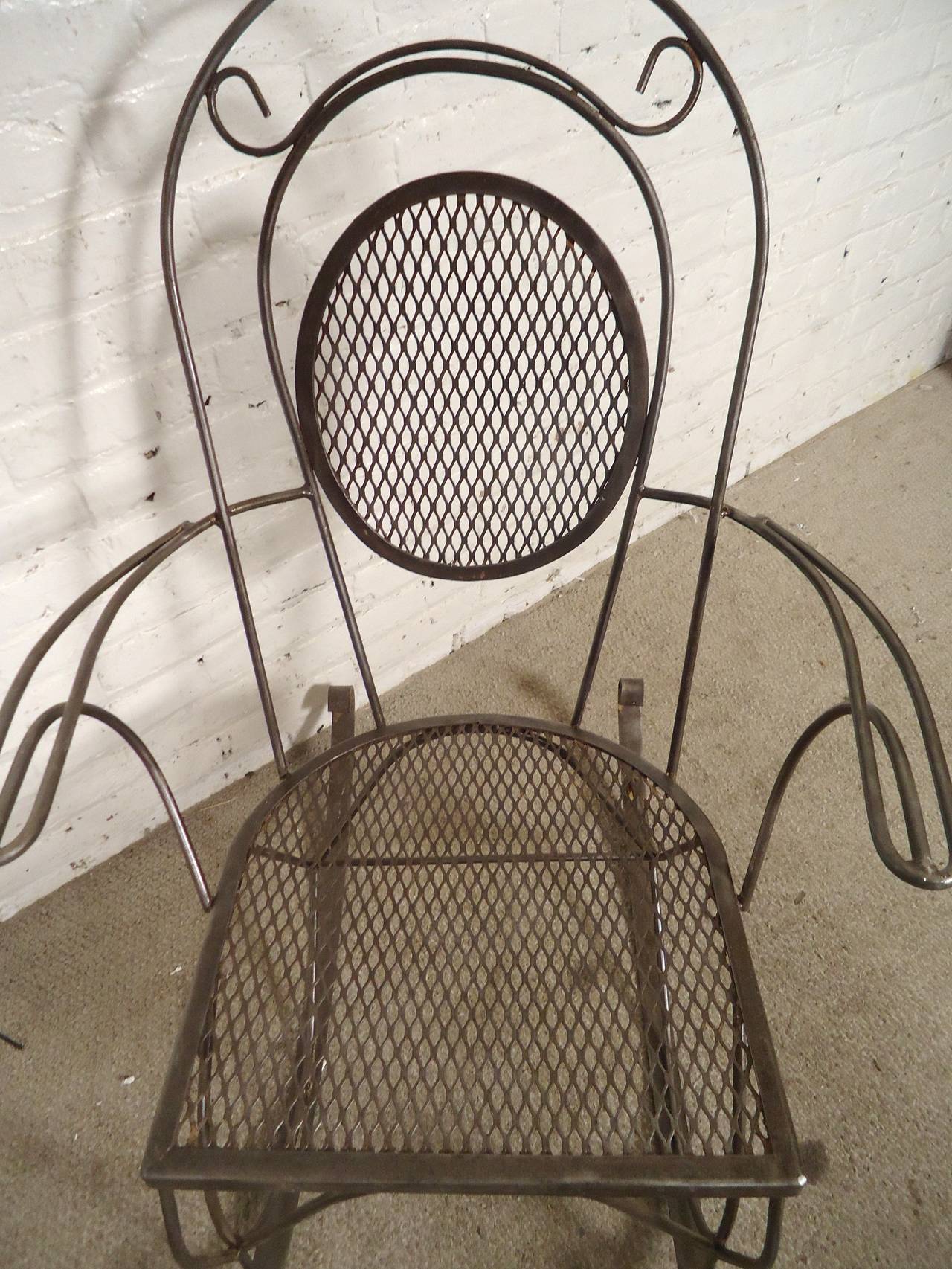 vintage wrought iron rocking chair