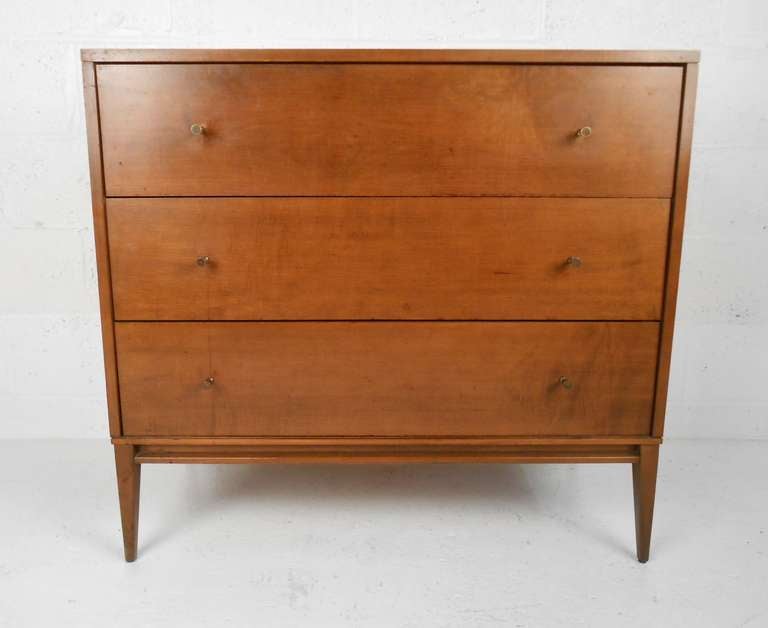 Three drawer Planner Group dresser with brass pulls for Winchendon. Please confirm item location (NY or NJ) with dealer.