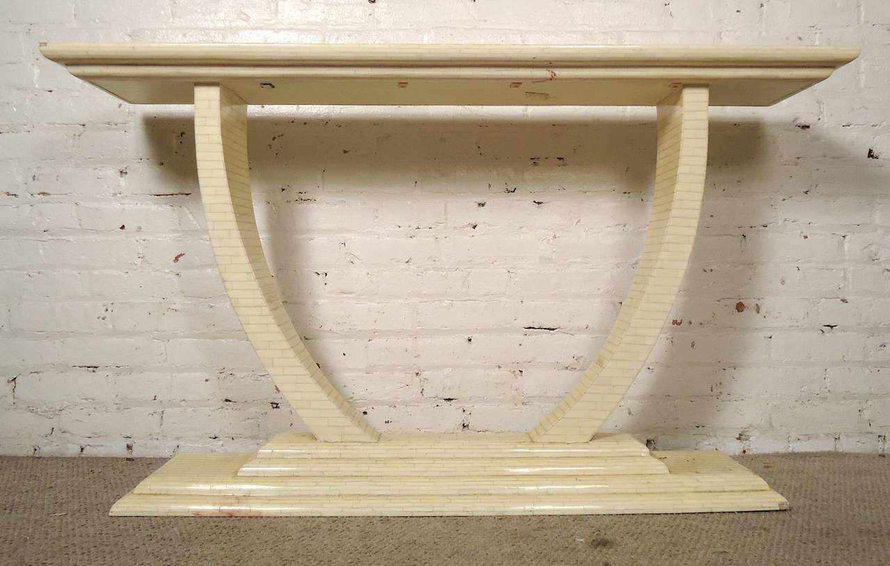 Console table made of marvelous tessellated bone in a herringbone style. Elaborate curved 