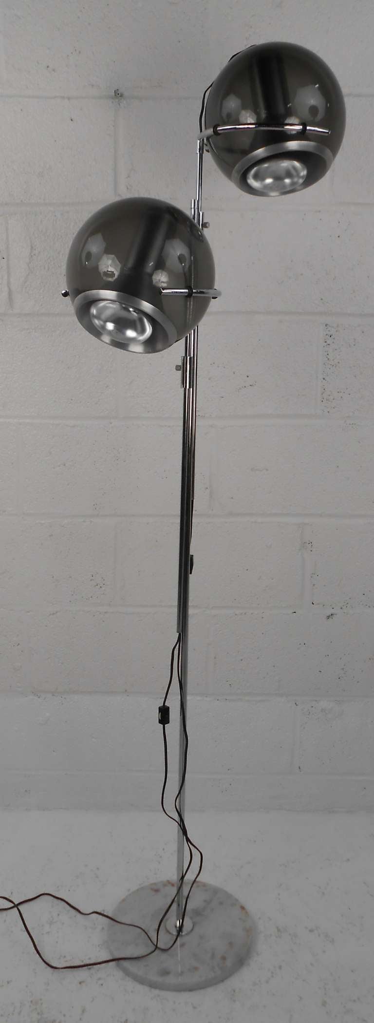 Adjustable two globe floor lamp in the style of Raak Amsterdam. Stamped 