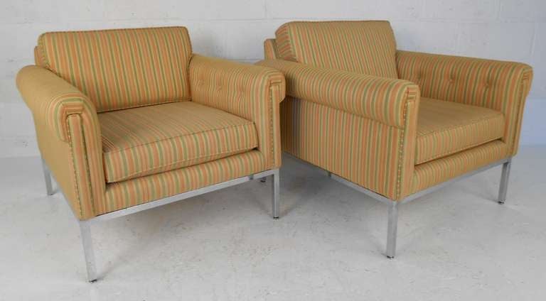 Unique pair of midcentury chairs with comfortable upholstered seats and chrome bases. Please confirm item location (NY or NJ) with dealer.