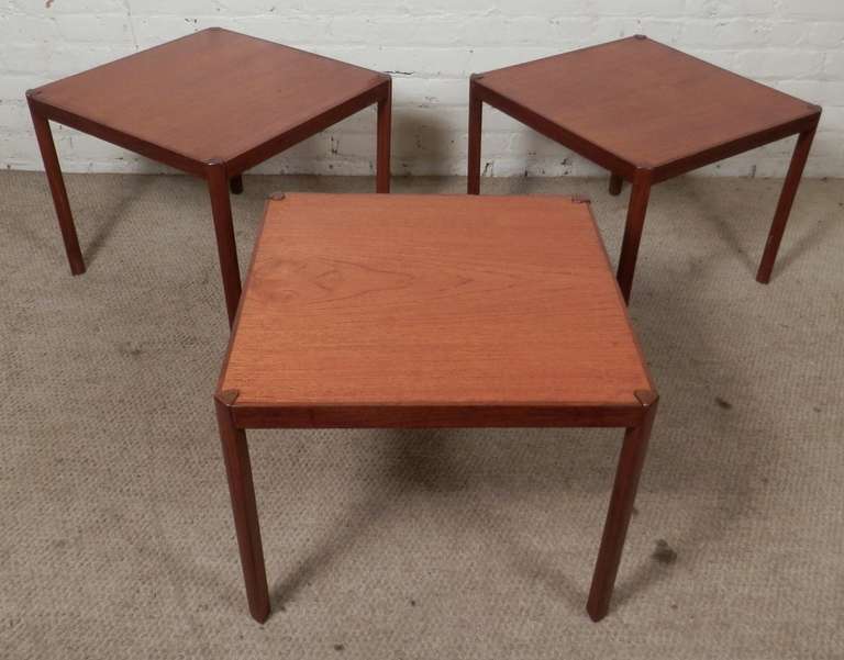 Wonderful side tables in teak grain designed by Hans Olsen for Lem Senge. Simple and elegant design, stylish and functional.

(Please confirm item location - NY or NJ - with dealer)