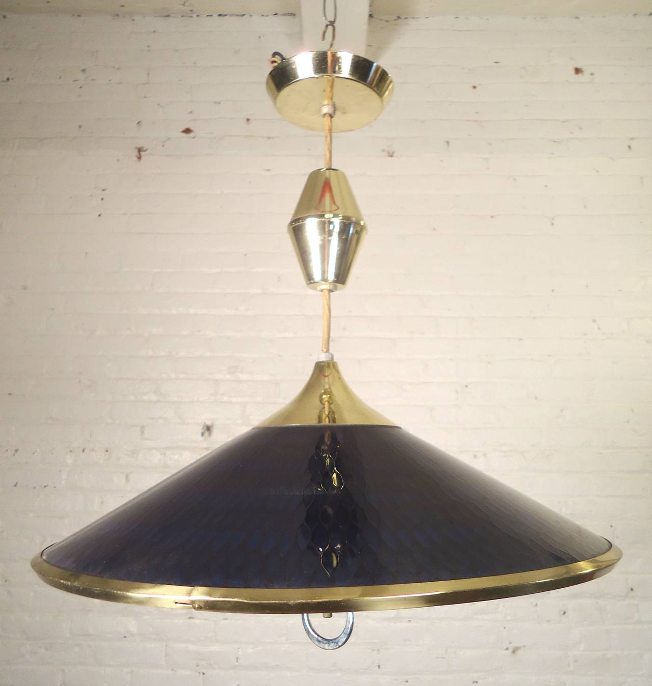 Mid-century modern hanging lamp with vivid coloring. Colored lucite with brass tint hardware. The deep blue and green mosaic dome are beautiful when illuminated.

(Please confirm item location - NY or NJ - with dealer)