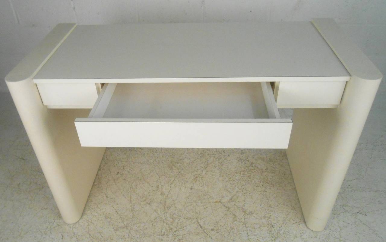 This wonderful vintage grass style desk offers a clean and simple modern design. Single center drawer for storage, wide open space beneath writing surface, also a wonderful candidate for vanity or makeup table if paired with mirror. Please confirm