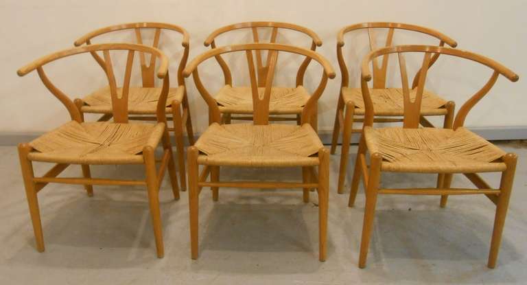 Set of six original Wishbone Chairs designed by Hans Wegner in 1949 and manufactured by Carl Hansen & Son. Also known as the Y Chair it was one of his most successful designs and helped establish Denmark as an international leader of modern design.