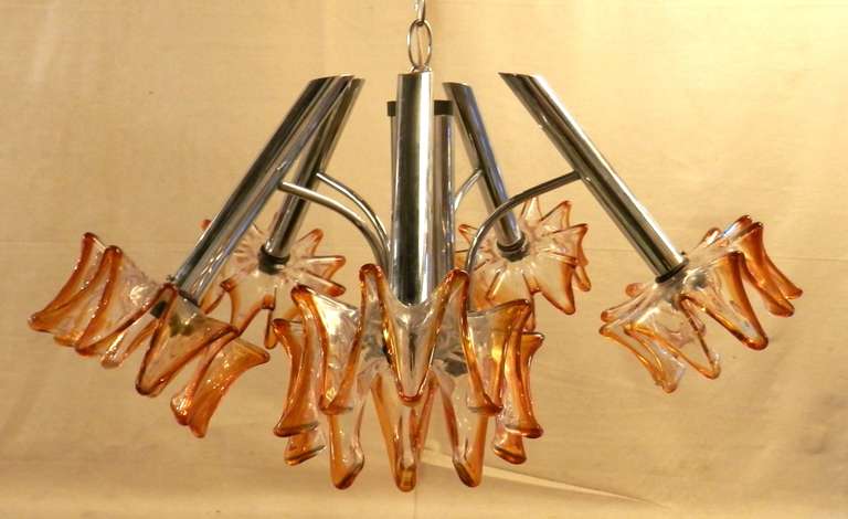 This is a very unique chrome Italian blown glass chandelier from designer A.V. Mazzega. Often called the 