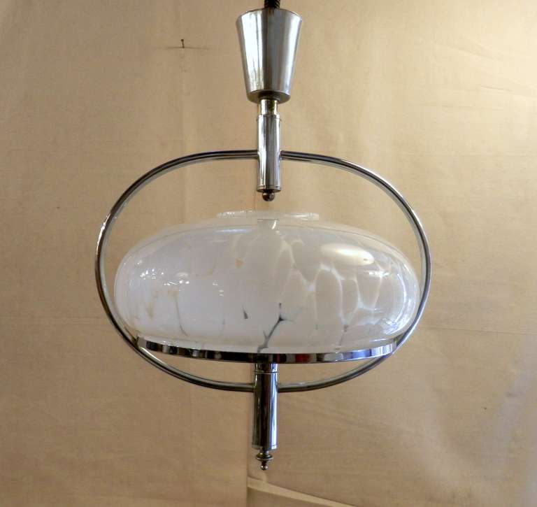 Beautiful and unusual chrome pendant chandelier. The globe with speckled frosting to the glass creates a beautiful textured and diffused light effect.

(Please confirm item location - NY or NJ - with dealer)