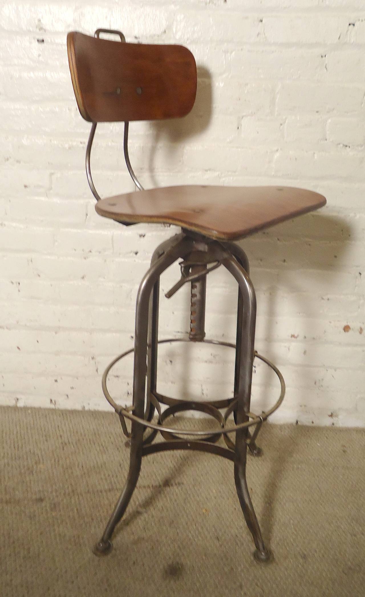 Set of four Toledo stools completely restored. Hand rubbed finished bentwood seats, Industrial bare metal style base. Gives a great contrast to your modern bar or kitchen island.

(Please confirm item location - NY or NJ - with dealer).