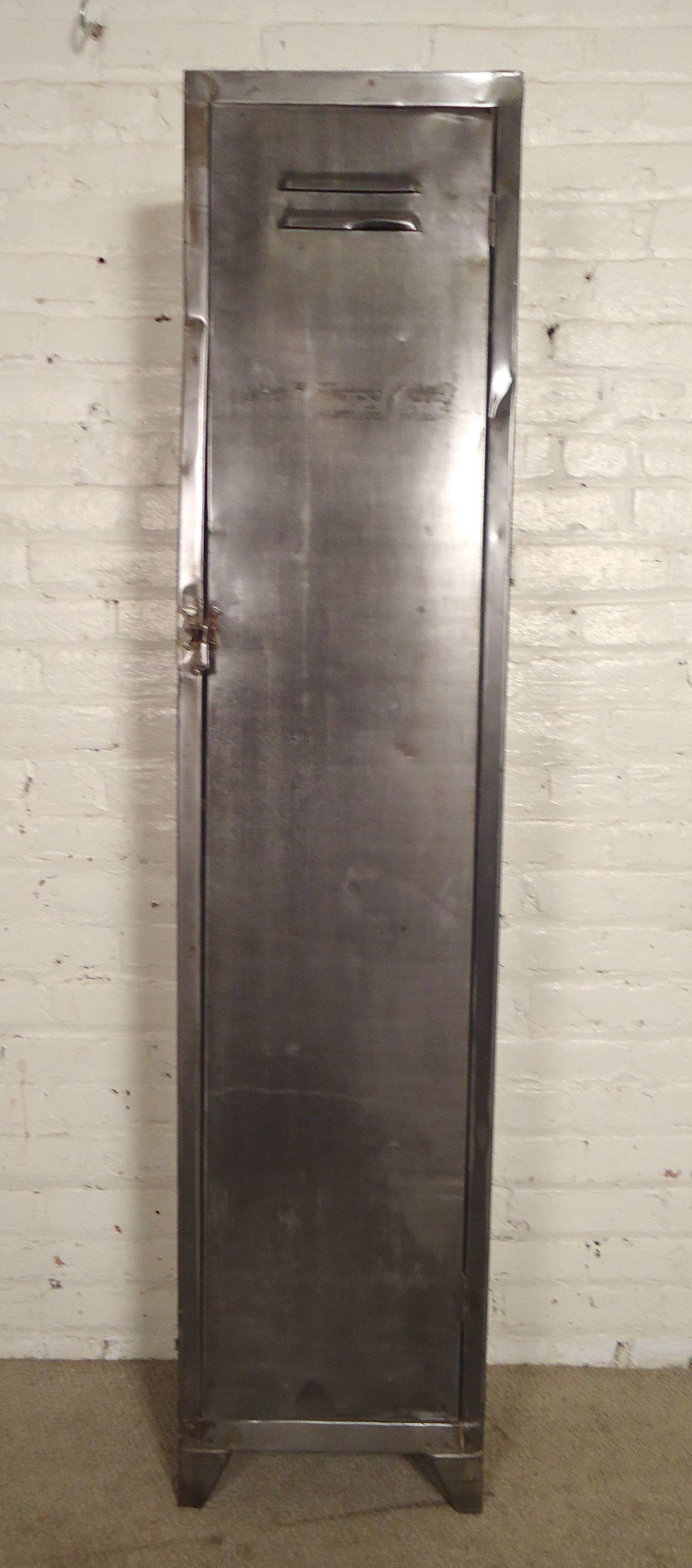 Restored metal locker unit with removable shelving. Great factory style with a bare metal look. Great for bedroom storage or kitchen organizer.

(Please confirm item location - NY or NJ - with dealer)