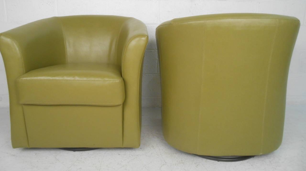 Mid-Century Modern Pair of Mid Century Style Green Vinyl Swivel Club Chairs