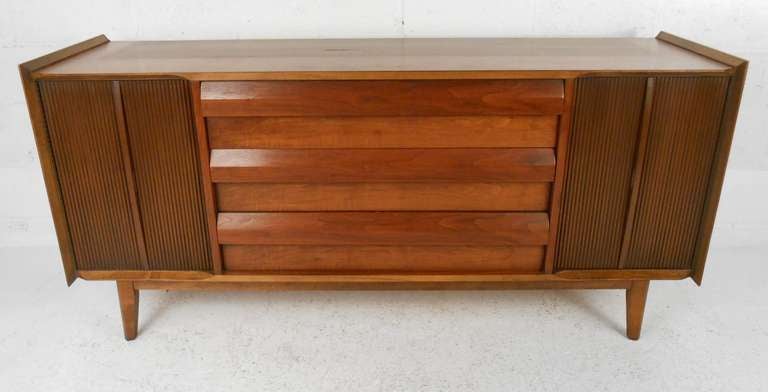 Mid-century walnut credenza by Lane. Please confirm item location (NY or NJ) with dealer.