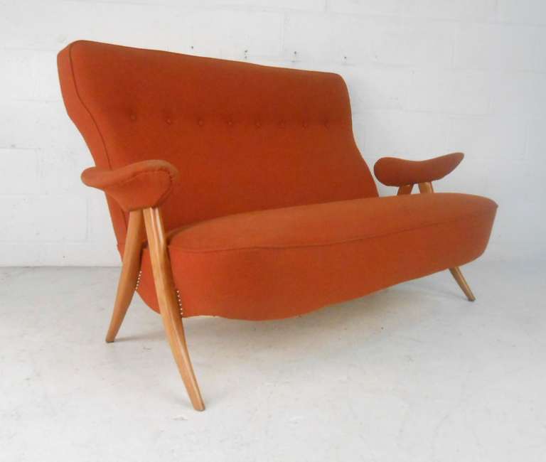 Stylish, sculptural sofa produced by Theo Ruth for Artifort, circa 1950s. Please confirm item location (NY or NJ) with dealer. Matching chairs available.