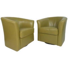 Used Pair of Mid Century Style Green Vinyl Swivel Club Chairs