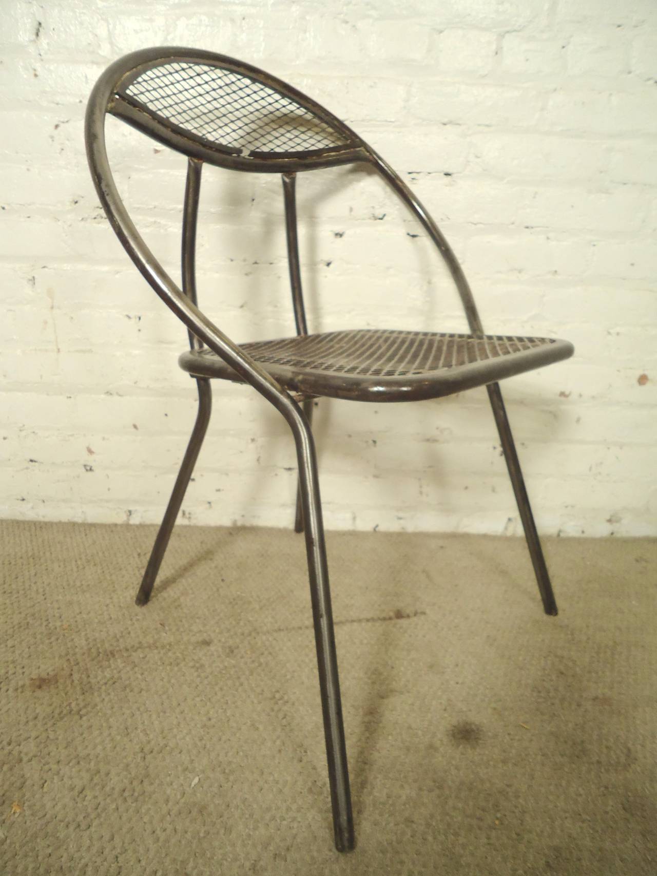 Vintage modern round back chairs refinished in an industrial style finish. Clam shape backs with mesh seating.

(Please confirm item location - NY or NJ - with dealer)