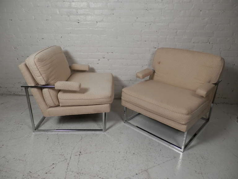 Stylish pair of chrome frame club chairs add Mid-Century Modern style to home or office seating arrangements, offering Milo Baughman style. Great form and comfort.

(Please confirm item location - NY or NJ - with dealer).