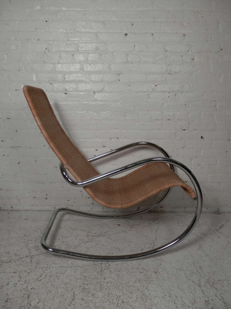 Vintage rocking chair with tubular steel and woven wicker seat. Great sculptural shape.

(Please confirm item location - NY or NJ - with dealer)