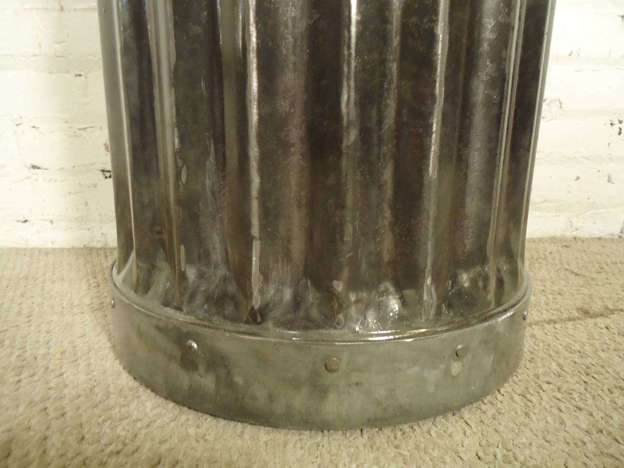 Decorative factory receptacle, stripped to bare metal and sealed. Makes for a handsome modern garbage can or hamper.

(Please confirm item location - NY or NJ - with dealer)