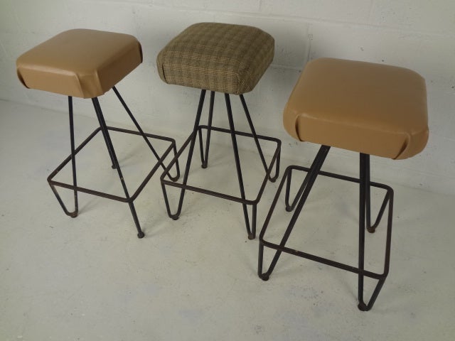 Set of three Frederick Weinberg bar stools with hairpin iron frames.