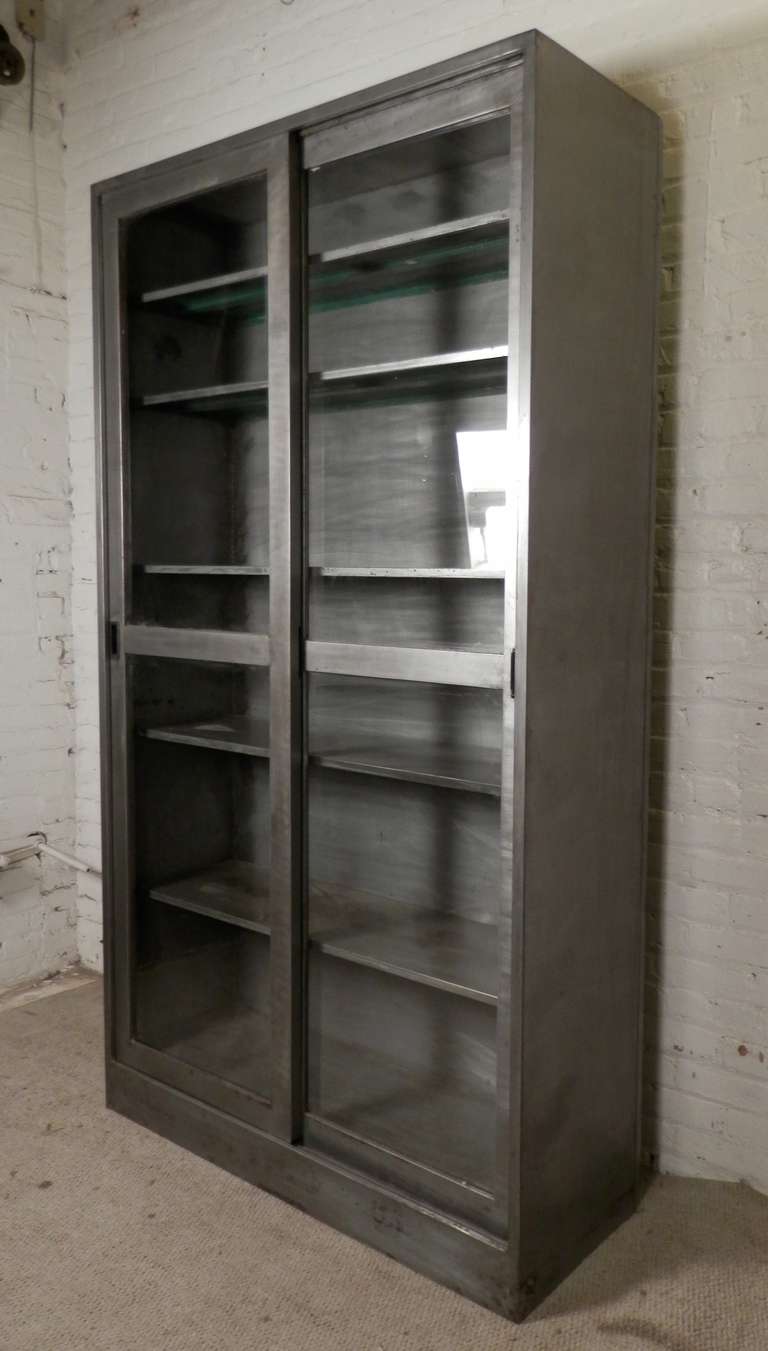 Large Double Door Mid-Century Metal Cabinet In Distressed Condition In Brooklyn, NY
