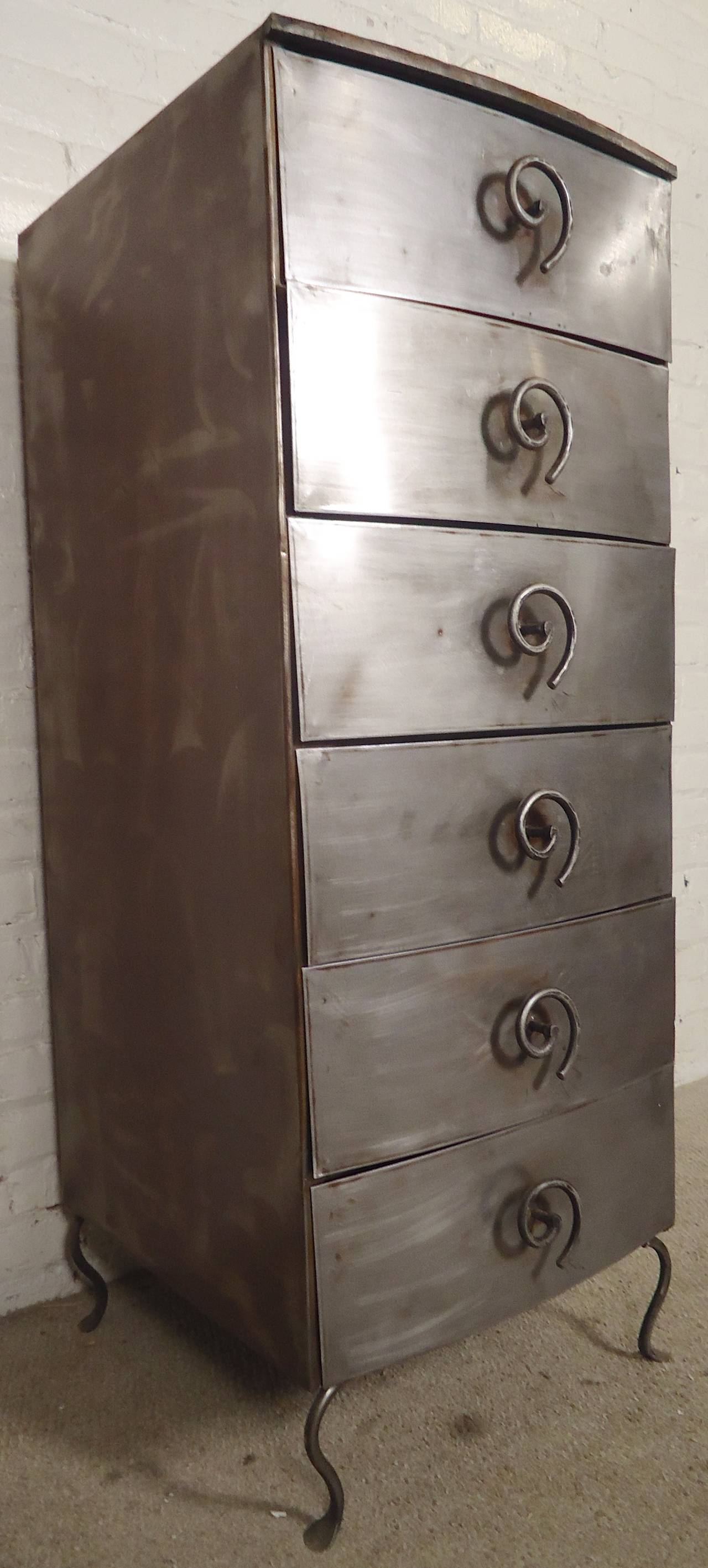 Unique metal dresser featuring six drawers with sculpted bent iron pulls and beautifully sculpted legs.

(Please confirm item location - NY or NJ - with dealer)
