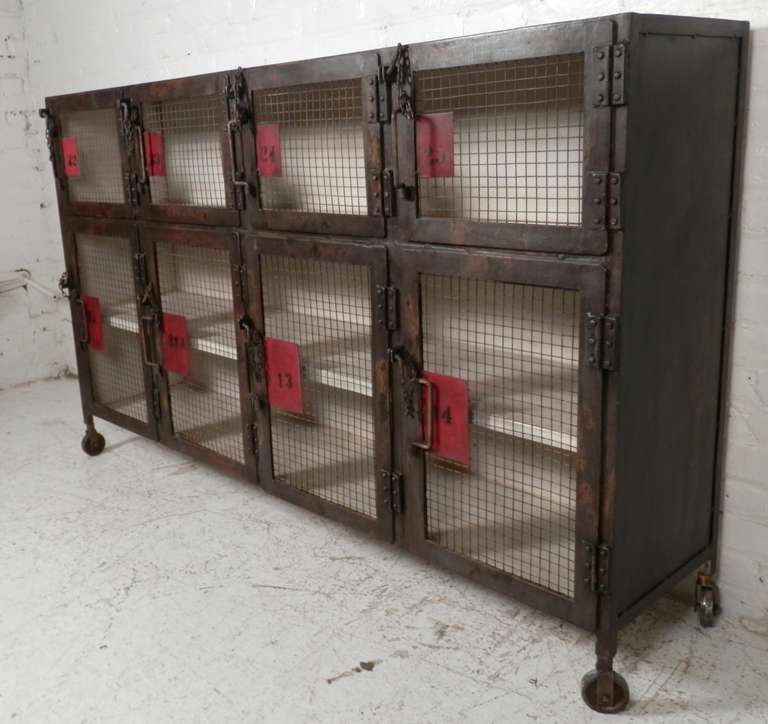 Large Industrial metal cabinet with mesh wire doors on casters. Includes vintage coupe tags and individual locks for each cabinet. Makes for great bar storage.

(Please confirm item location, NY or NJ, with dealer).