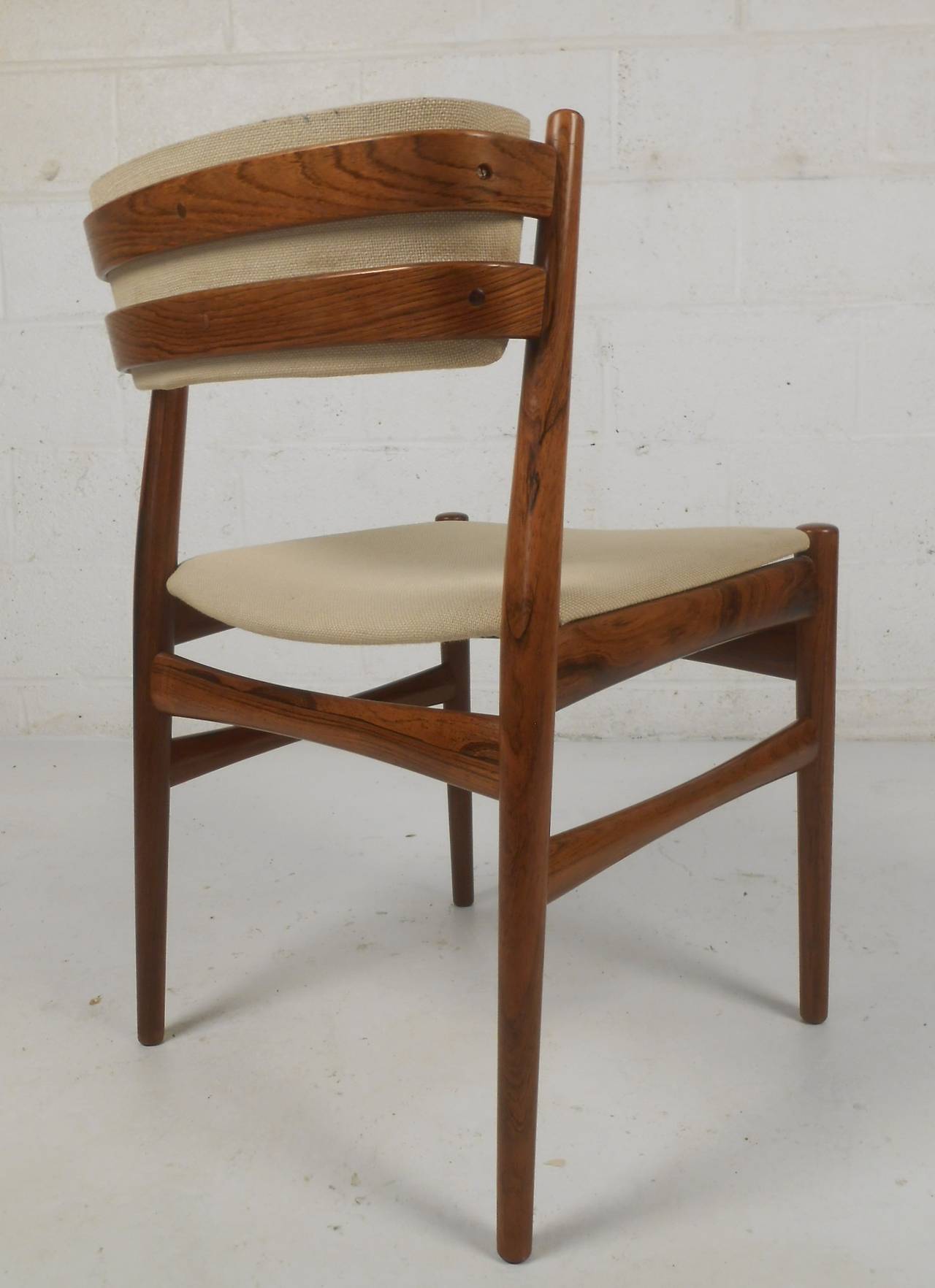 Beautifully detailed set of four rosewood dining chairs. Please confirm item location (NY or NJ) with dealer.