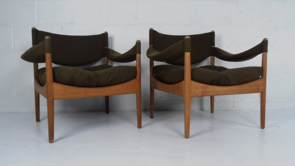 Oak frames and fabric upholstered pair of sling arm chairs by Solmer-Vedel for Soren Wiladsen.