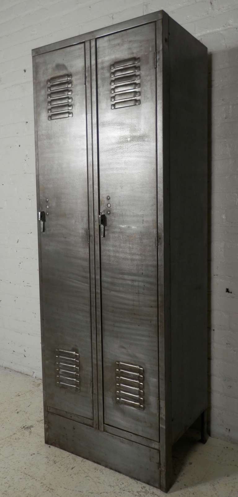 Double door bare metal industrial style locker. Please confirm item location (NY or NJ) with dealer.