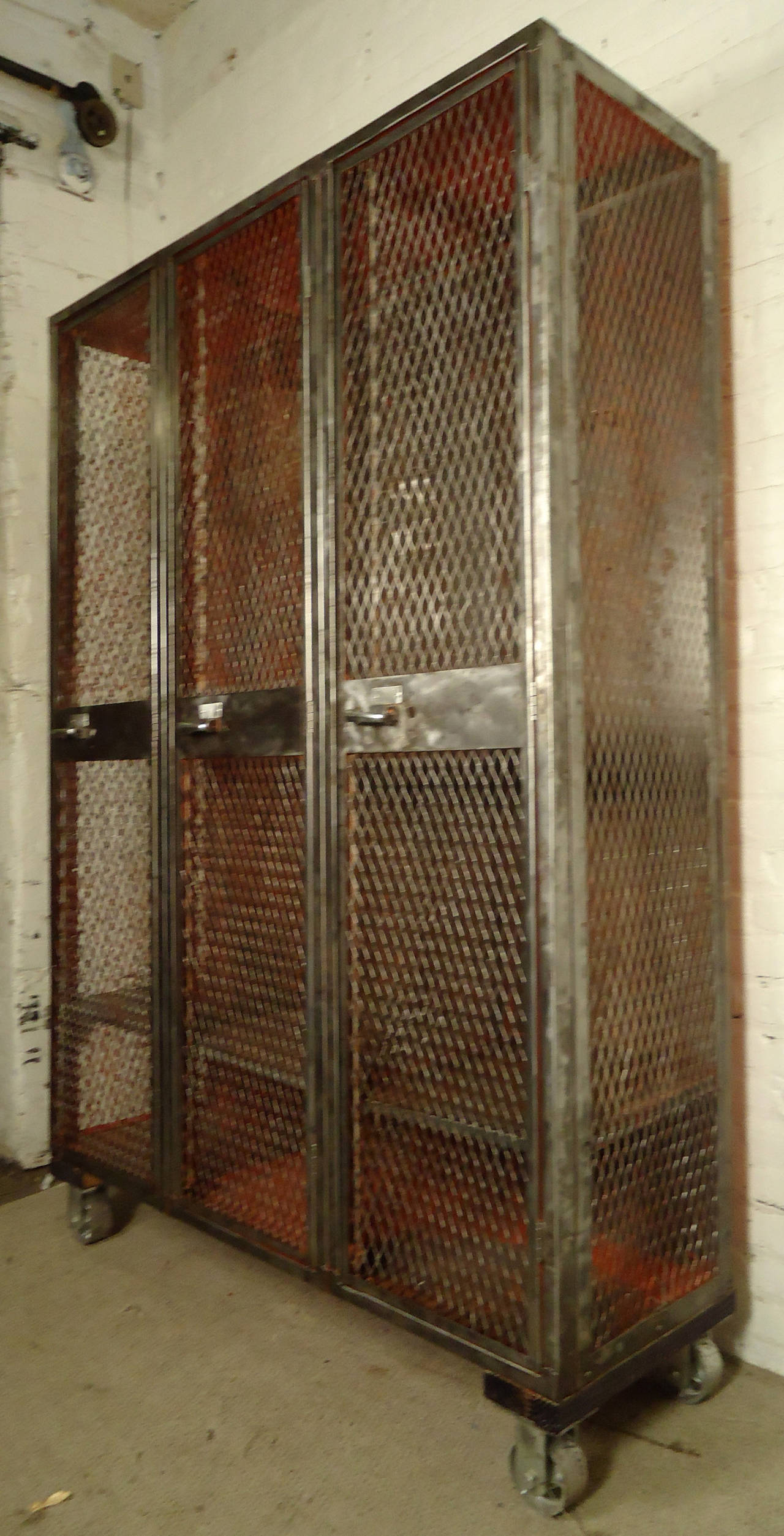 Impressive Three-Door Industrial Locker Unit on Casters In Distressed Condition In Brooklyn, NY