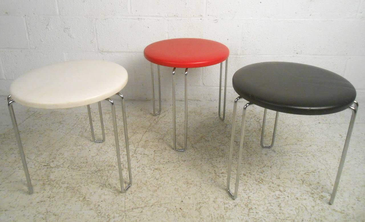 Mid-century modern style vinyl top stools with sturdy hair pin legs. Made in Italy, easily stacked for storage.

(Please confirm item location - NY or NJ - with dealer)
