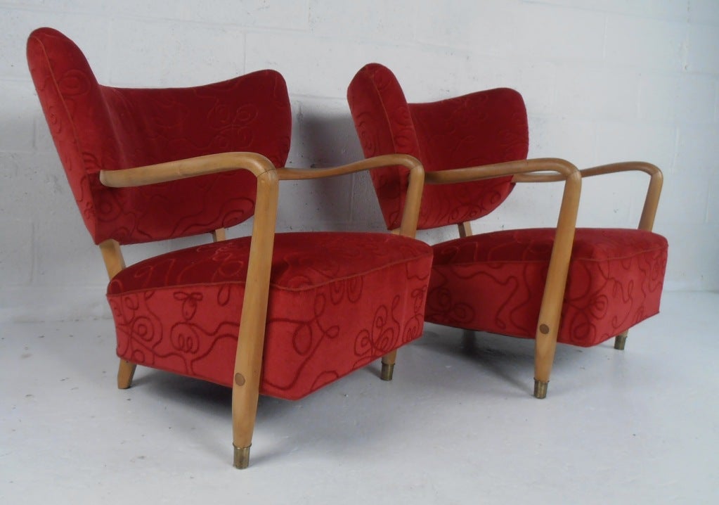 Low & stylish lounge chairs with maple frames.