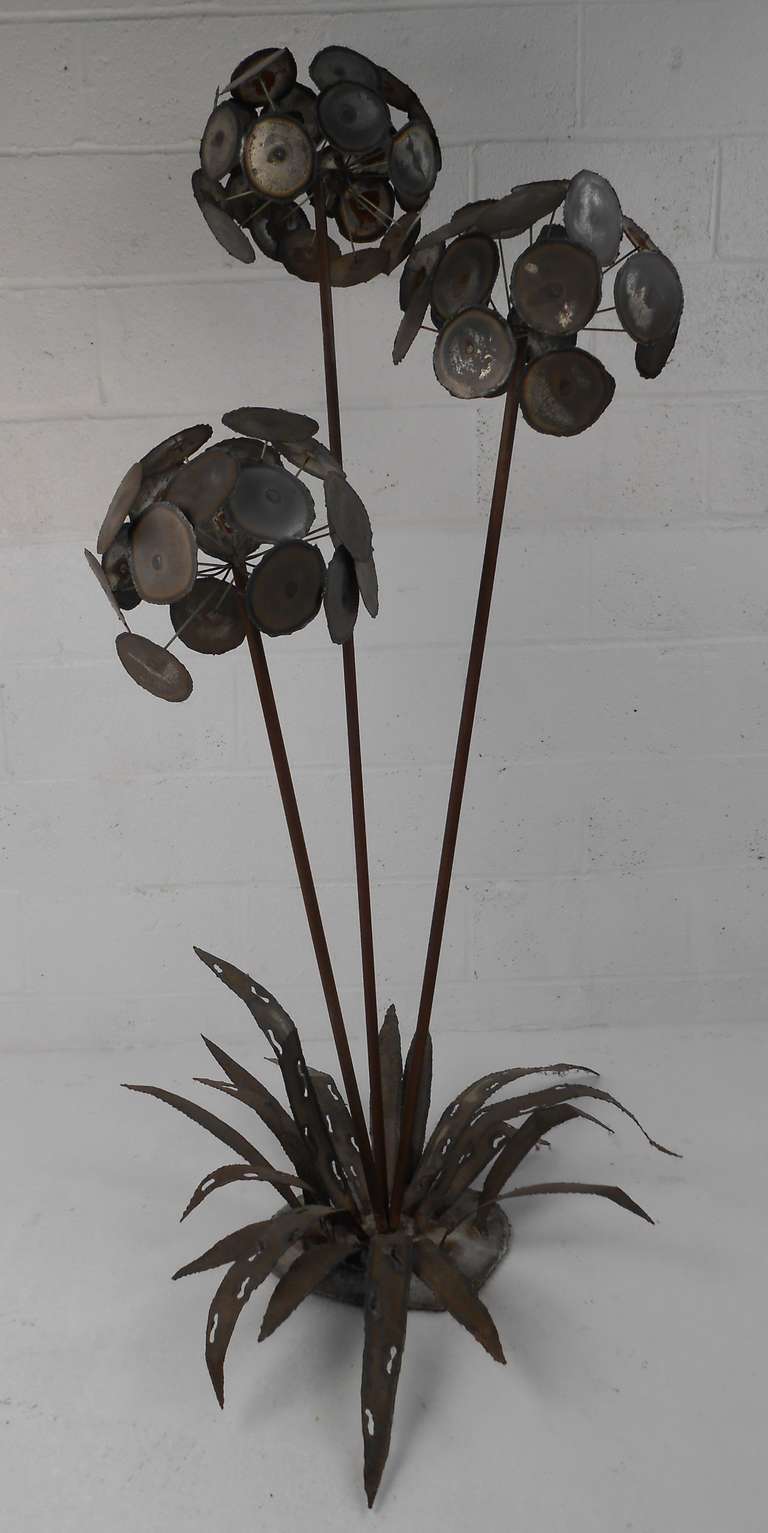 This stylish industrial modern sculpture is attributed to mid-century artist Silas Seandel. Hammered metal with an industrial finish makes an impressive and unique addition to home or business.  Please confirm item location (NY or NJ) with dealer.