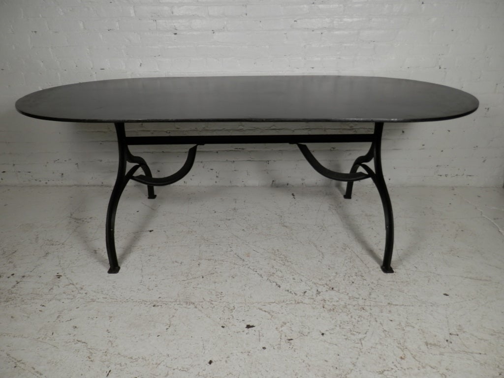 Heavy duty cast iron dinning table. Solid black iron top on thick iron base. Top can be separated from base for easy move.

(Please confirm item location - NY or NJ - with dealer)