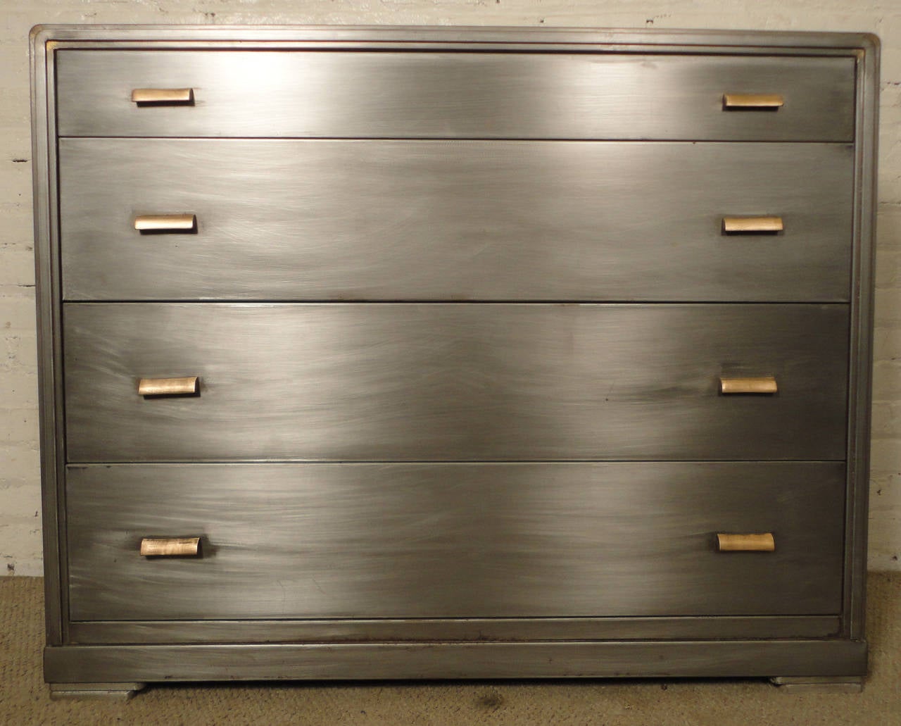 Vintage modern Industrial-style 1960s Simmons dresser, features four drawers with sculpted brass handles.

(Please confirm item location-NY or NJ-with dealer).