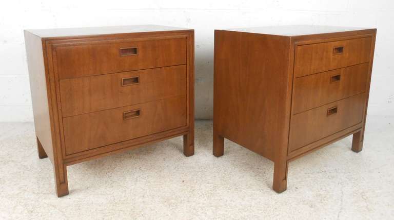 This pair of three drawer mid-century nightstands by Mount Airy Furniture Company feature a solid walnut construction with recessed drawer pulls. Please confirm item location (NY or NJ) with dealer.