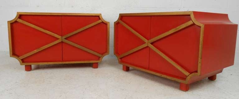 Unique mid-century modern pair of red lacquered cabinets with gold accents. Perfect pair of storage end tables for bedroom or living room use, make an impressive addition to any interior. Please confirm item location (NY or NJ) with dealer.