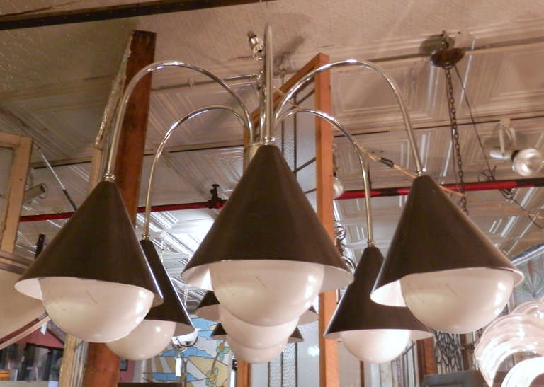 Vintage lamp with black cone shades hanging from cascading chrome arms. Globes pictured are a large white bulb (any standard bulb can be used). An attractive addition to your dining room or entry way.

(Please confirm item location - NY or NJ -