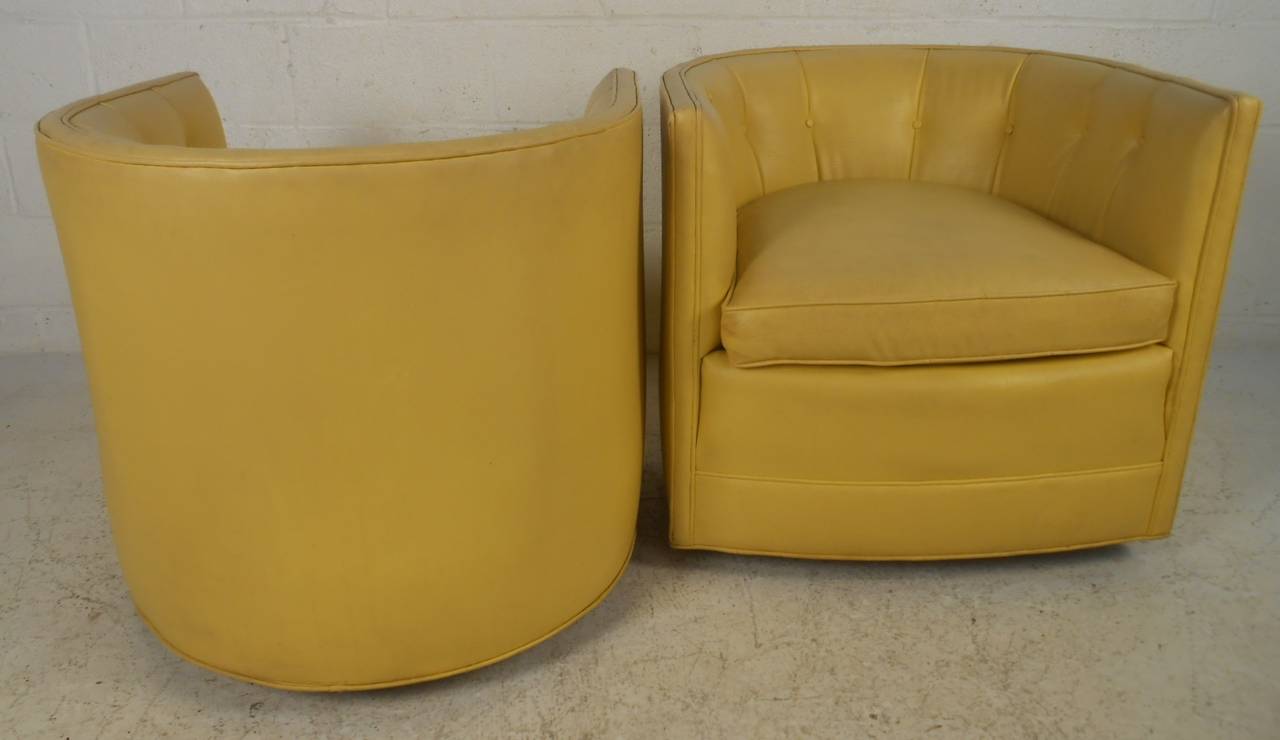 yellow swivel barrel chair