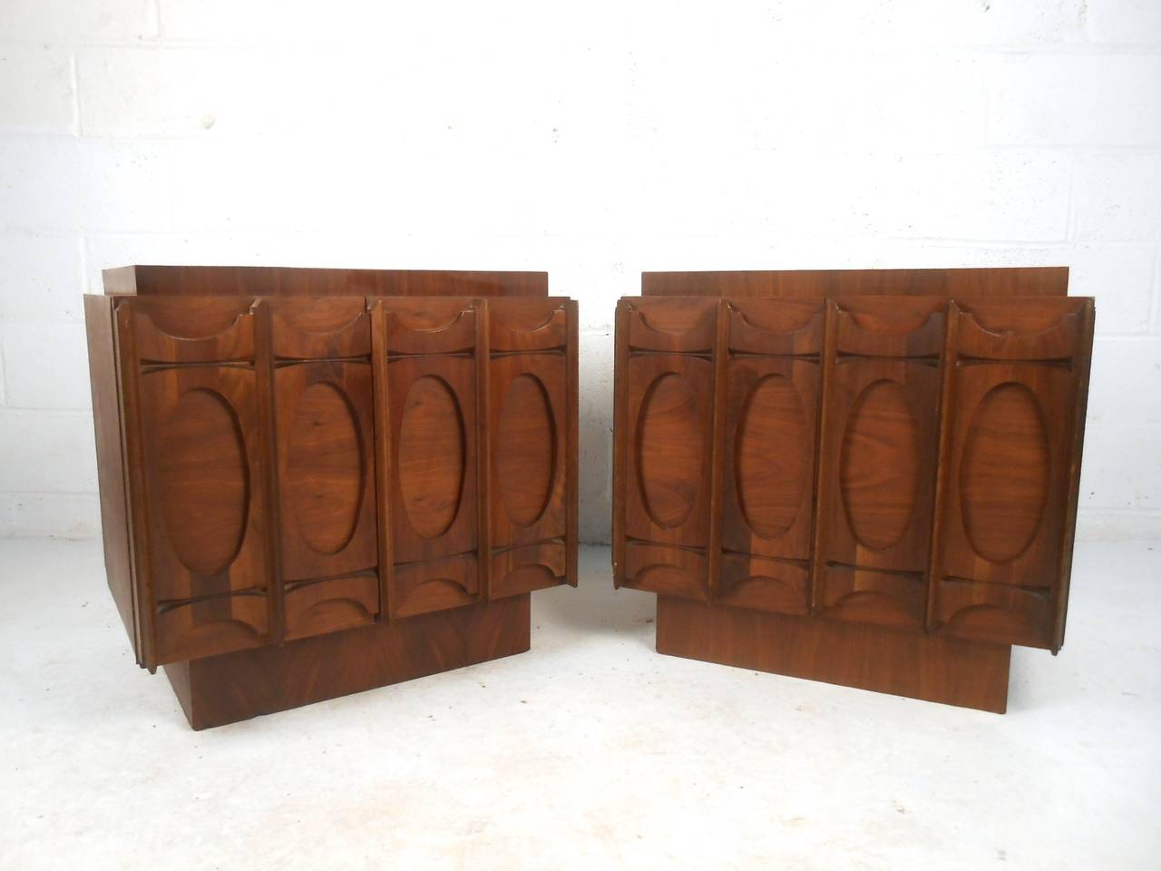 This Brasilia style pair of nightstands offer cabinet style shelf storage within a uniquely Mid-Century design. This Brutalist feeling pair work great in any room, please confirm item location (NY or NJ).