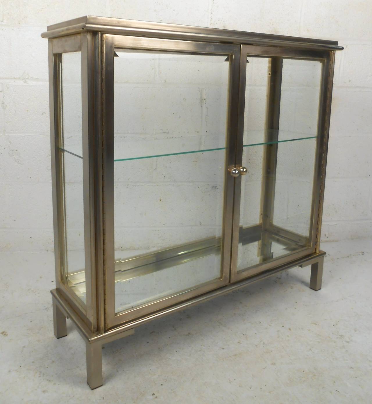 mid century glass display cabinet