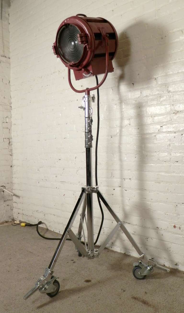 Fully adjustable stage lamp with locking casters. Can make a great industrial studio floor lamp. Features flood-to-spotlight settings and sturdy metal tripod base.

Height adjust 75
