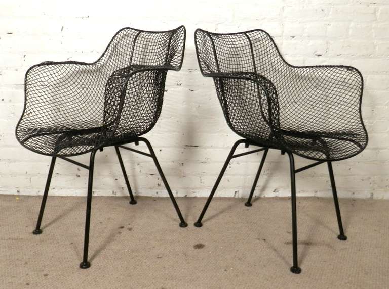 Iconic mesh wire chairs by mid-century designer Russell Woodard. Great curves and flowing form, thus called the 