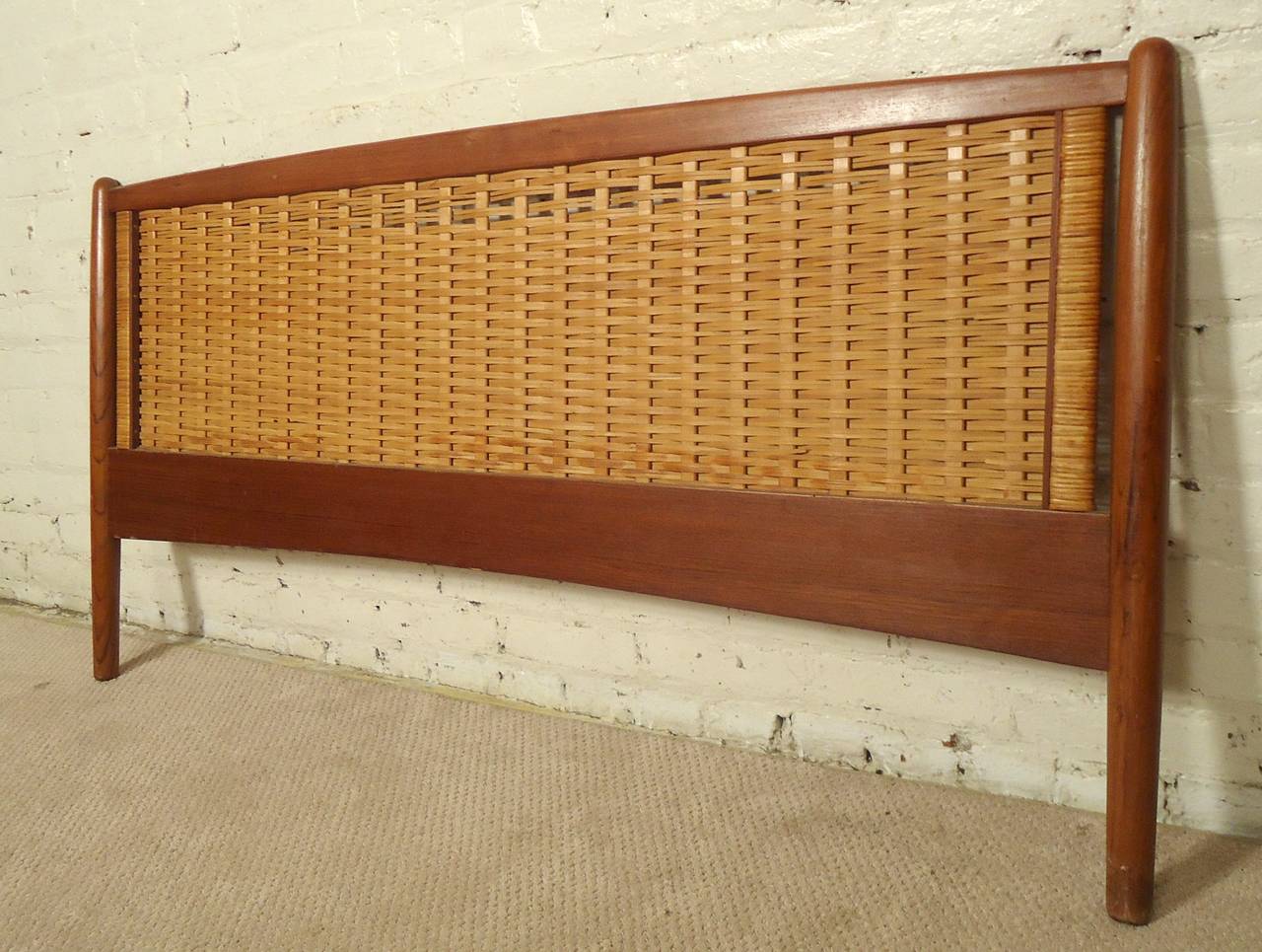 Mid-century modern woven headboard with teak frame with matching foot board. 
Headboard: 58
