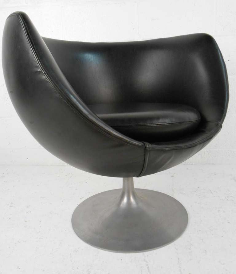 Overman Swedish pod chair in black vinyl with aluminum tulip base. Please confirm item location (NY or NJ) with dealer.