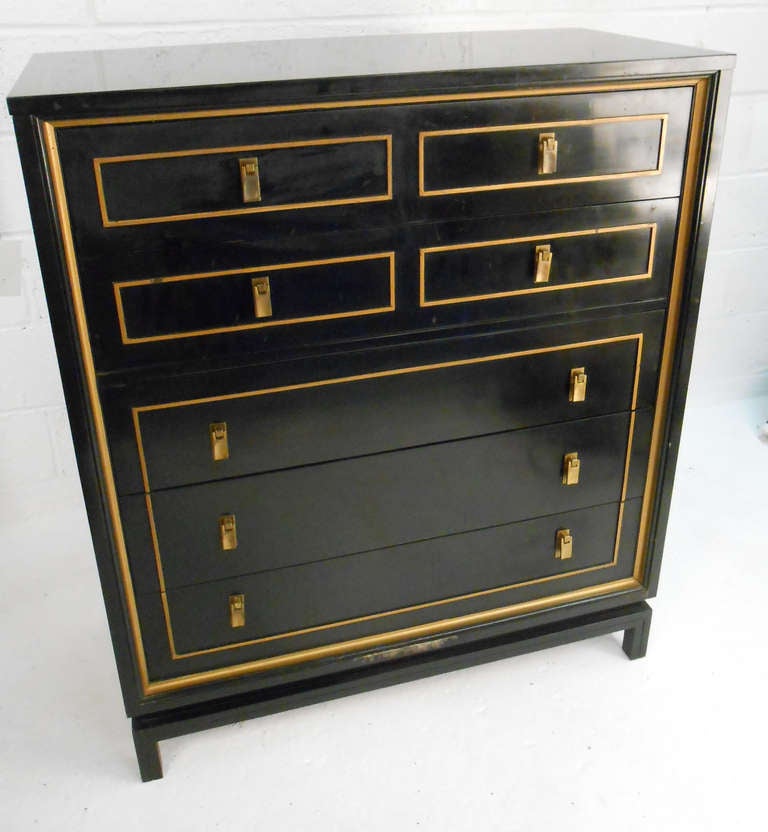 This beautiful mid-century highboy by American of Martinsville in black lacquer with stylish gold trim comes complete with matching mirror. Please confirm item location (NY or NJ).