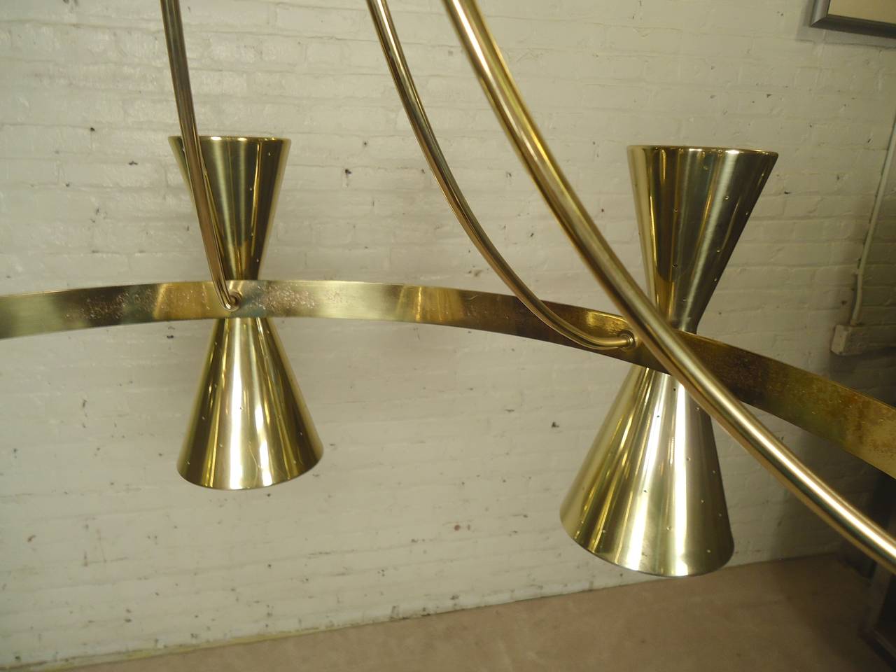 Unusual brass colored fixture with six lamps giving both upward and downward lighting. Large size giving plenty of illumination. 

(Please confirm item location - NY or NJ - with dealer).