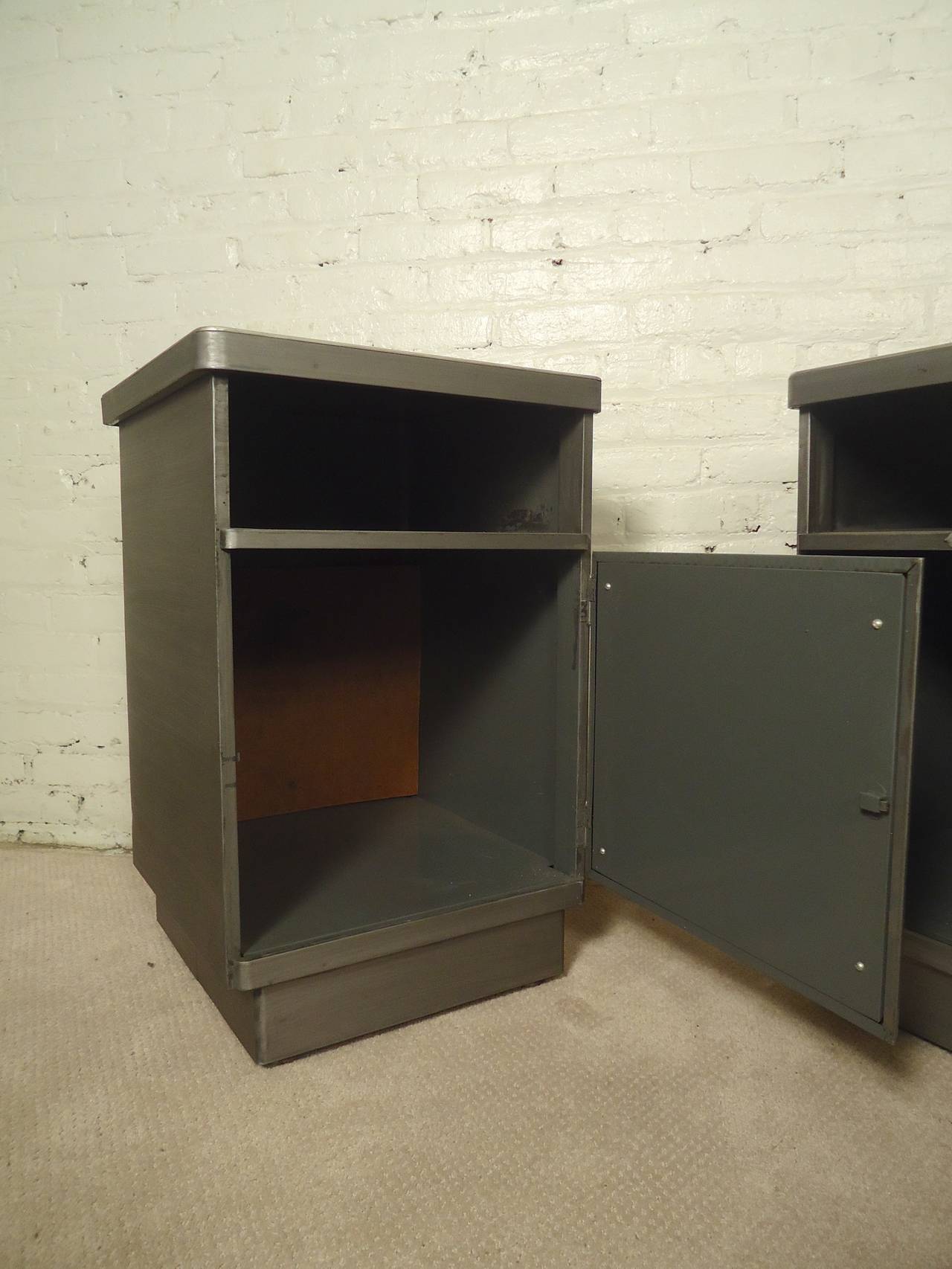 Vintage metal cabinets have been restored in a striking bare metal style finish. Original tops, top open cabinet and large cabinet space with door. Great for use as sofa tables or nightstands.
Listing is for single unit - only 1 available.

(Please