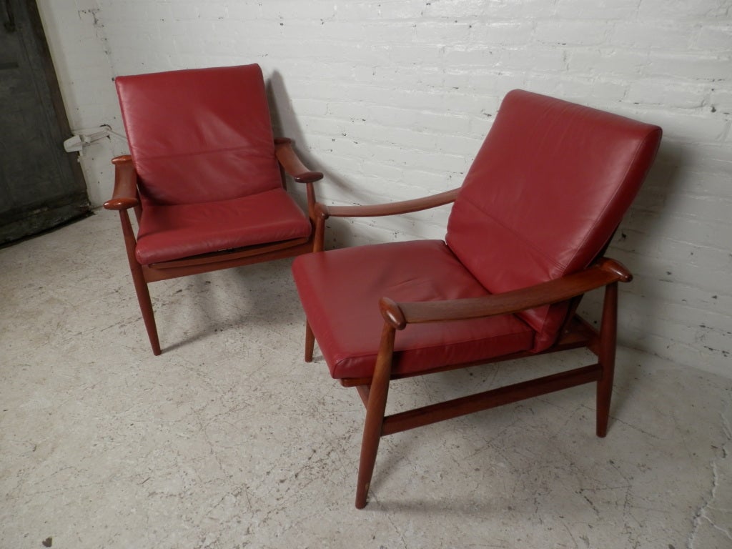 Pair of Teak Arm Chairs by John Stuart