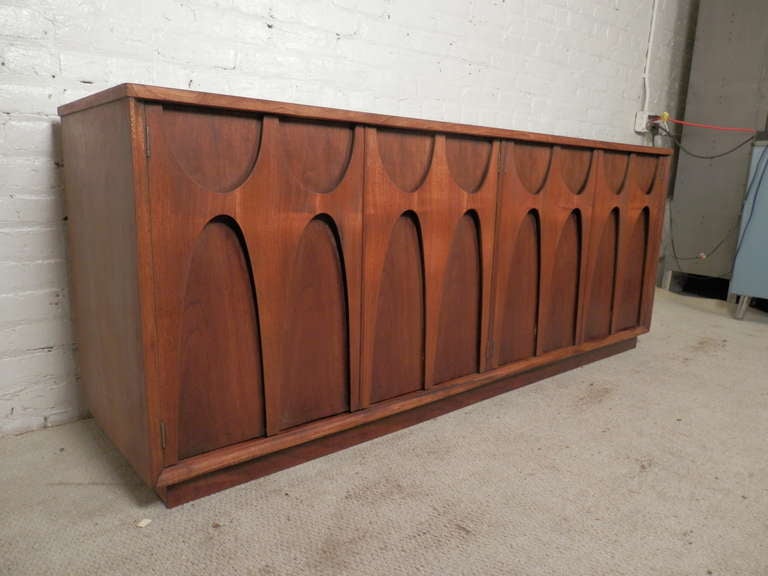 American Sculptured Front Mid-Century Walnut Credenza By Broyhill